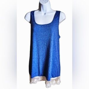 Light blue tank top with a lace embellishment